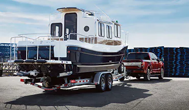 2022 Nissan TITAN Truck towing boat | Lynn Layton Nissan in Decatur AL
